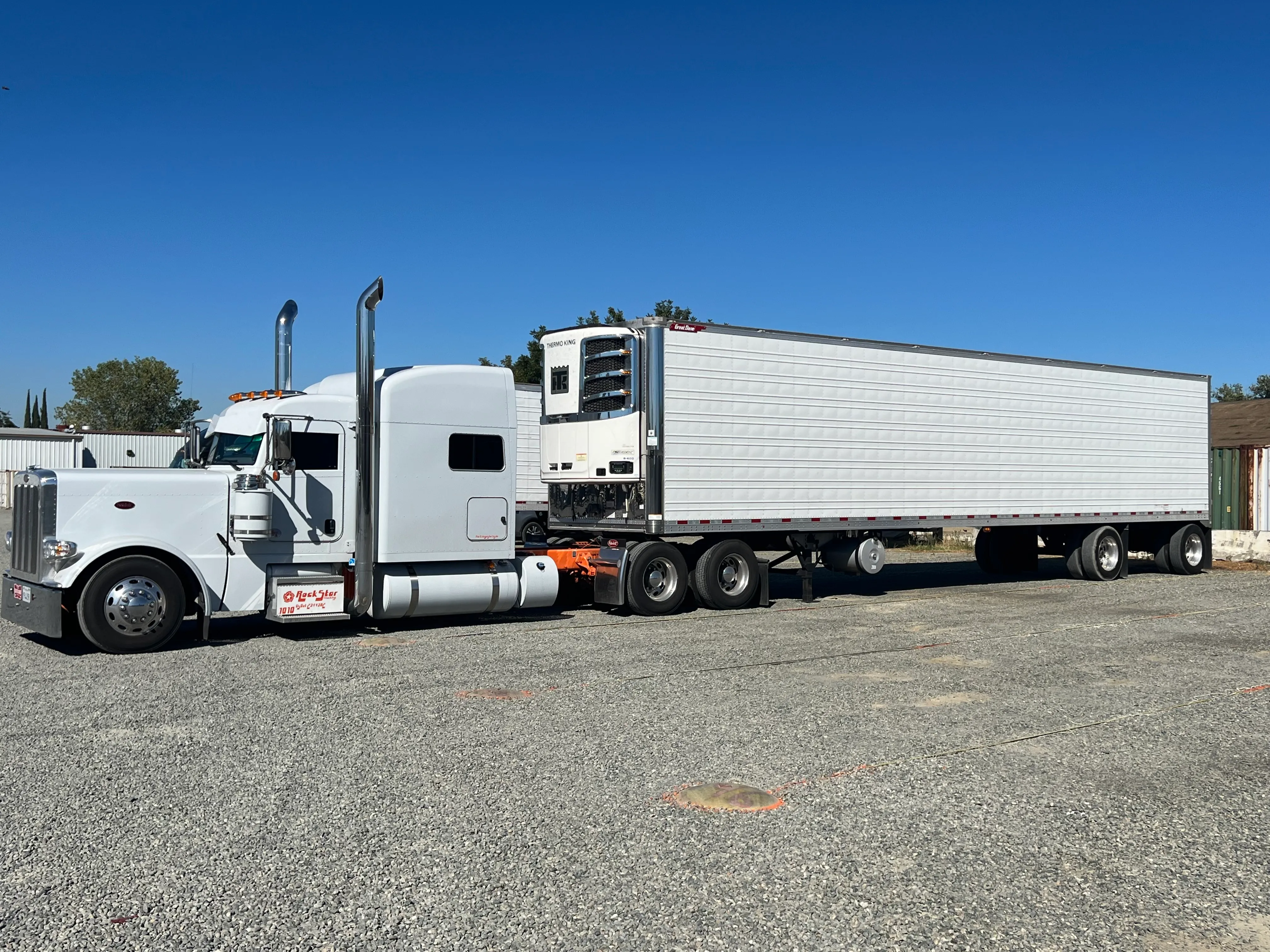 Rockstar Trucking rig with 53-foot refrigerated trailer at the yard